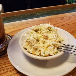 Finely shredded coleslaw, tasty, not swimming in liquid