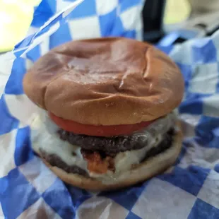 a close up of a burger