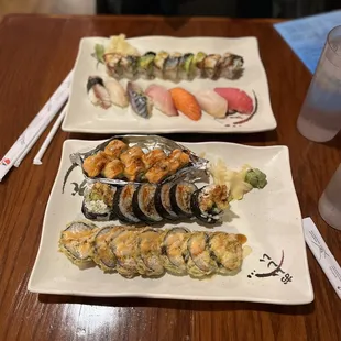 From bottom: lobster roll, spider roll, baked salmon, chef&apos;s choice nigiri and dragon roll