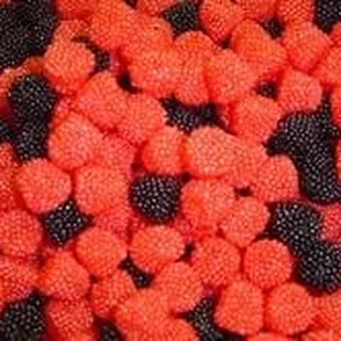 a close up of a bowl of candies