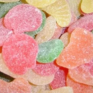 a close up of a pile of candies