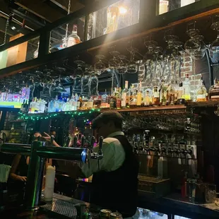 a bartender at the bar