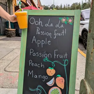 Ooh La La Passion Fruit smoothie. Contains apple, passionfruit, peach, and mango. Cold, refreshing, and delicious. $9.78 after tax and tip.