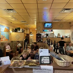 Left side of the restaurant. There are tables on the right.