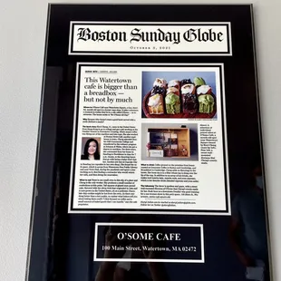 A Boston Globe feature from Sept 2021, proudly framed on the wall / June 2022