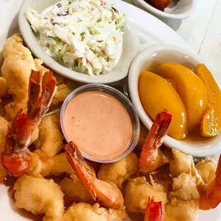 Shrimp with Cole slaw and peaches and hush puppies
