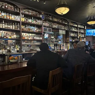 people sitting at the bar