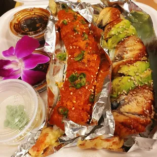 a close up of a plate of sushi