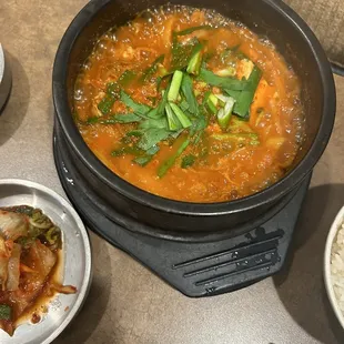 Kimchi jigae My sister found pork rind with the pigs hair still on there in this soup... kimchi ramen
