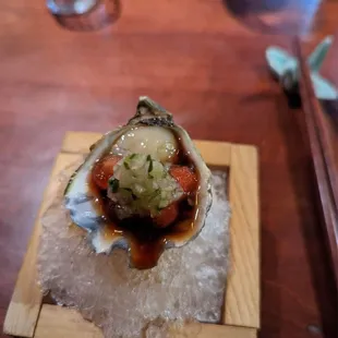 an oyster on a bed of ice