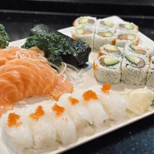Salmon Sashimi, Squid Sushi ,Beach Roll and California Hand Roll.