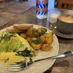 Veggie omelette w/ potatoes and a cappuccino