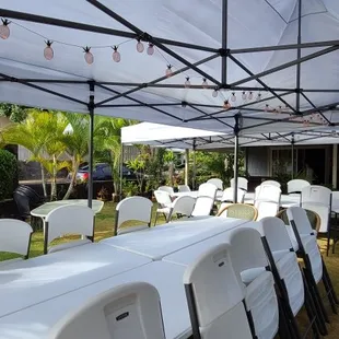 10x20 pop up tents, white tables, and chairs