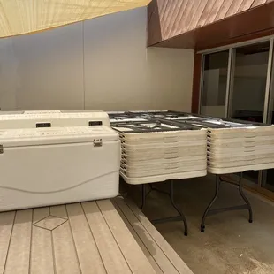 Tables, chairs and coolers