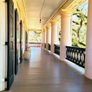 The second floor of the home on the wrap around porch...first time being on one