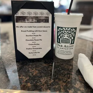 a cup of coffee and a menu