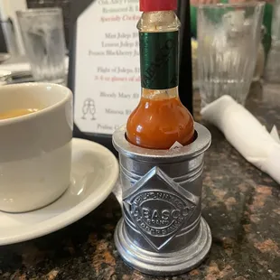 Serious hot sauce bling.  But what do you expect?  It's local-- like in Superman 2 he has more powers in the fortress of solitude