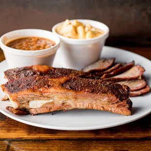 a plate of ribs and sides