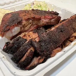 3 Meats and 2 Sides with briskets/ribs/pulled pork. North Texas style