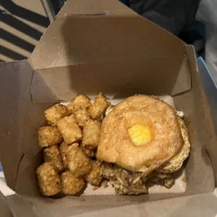 Boudin, egg and cheese on glazed donut