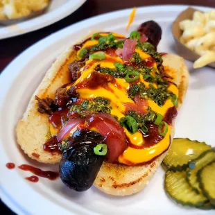 a hot dog with toppings