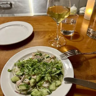 Delicious hamachi crudo aguachile and chardonnay