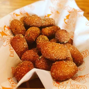 a basket of fried donuts