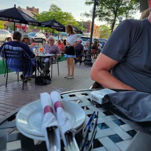 Outdoor dining on a hot night .
