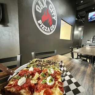 They do 1/2 &amp; 1/2 pizzas that are on the same crust. This is a Detroit style 1/2 pesto, 1/2 classic w/ extra basil. 5/5. July 2022.