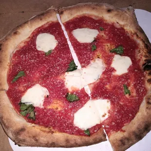 10&quot; margherita pizza, sparse toppings, but pretty good for what it is.