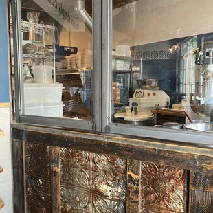 Peek into the coffee bean roasting area.