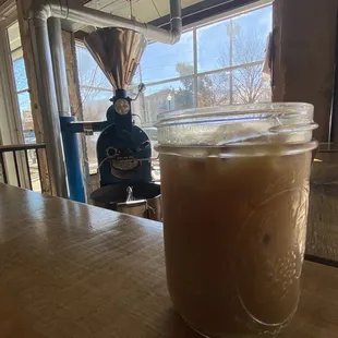 Me waiting with my coffee for my food