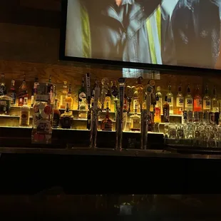 two men on a video screen