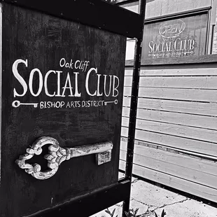a sign for oak cliff social club