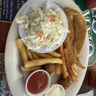 Catfish corn meal batter seasoned just right, slaw and golden fries