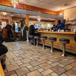 people sitting at the counter