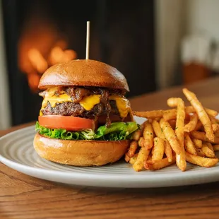 a hamburger and fries on a plate