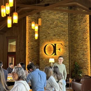 a group of people in a tasting room