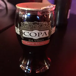 a glass of beer on a table