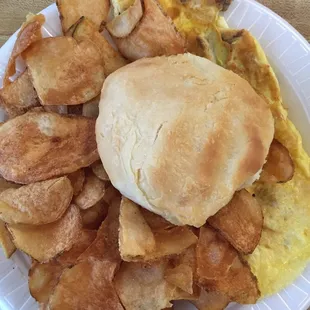 Loaded omelette (sausage, bacon, cheese, onion, green peppers), giant biscuit, and home fries. Best breakfast in Rocky Mount, NC.