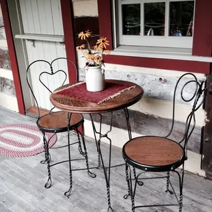 Outdoor cafe table dining on the front porch,if weather permits.