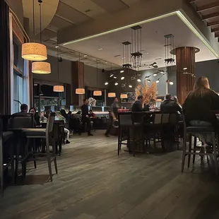 people sitting at the bar