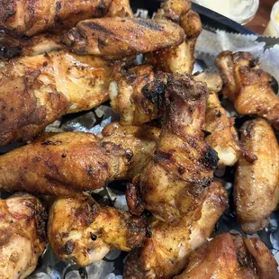a tray of chicken wings