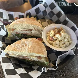 Gucci turkey, bacon and Swiss cheese with side of macaroni salad.