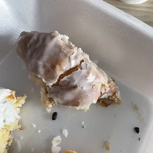 Fried croissant with a delicious glaze sorry I had to stop myself from inhaling it to be able to snap a picture