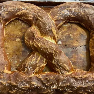 a pretzel on a baking sheet