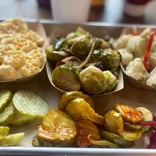 THREE CHEESE MAC, Balsamic Roasted Brussels Sprouts, Roasted Cauliflower, pickles, spicy pickles and pickled onions