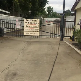 Facility Gate with posted Hours