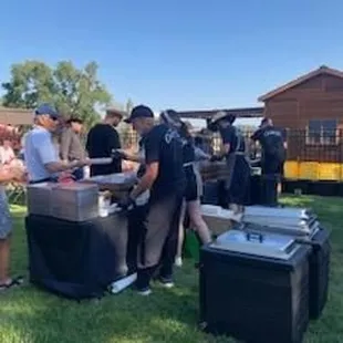 Oakhouse BBQ team serving guests..