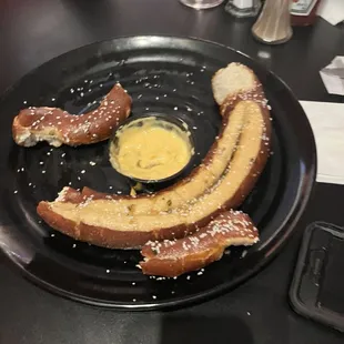 Baked Pretzel Covered with Garlic Butter with Beer Cheese